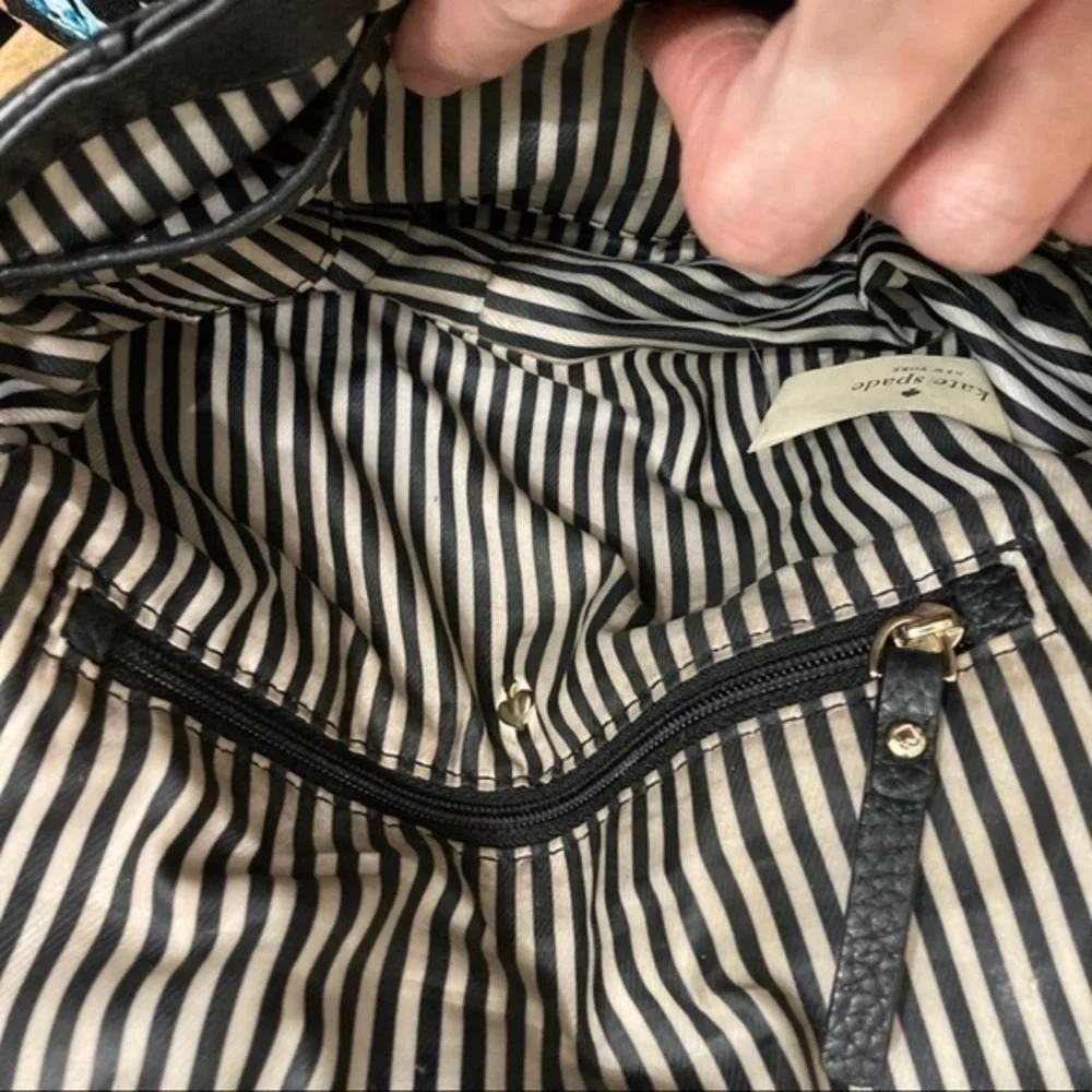 Kate spade black leather crossbody bag side expansion